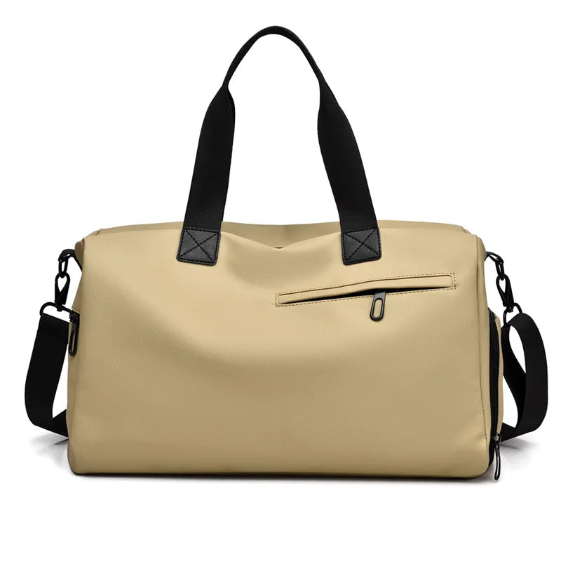 Beige duffel bag with black handles and shoulder strap, minimalist design for travel and commuting