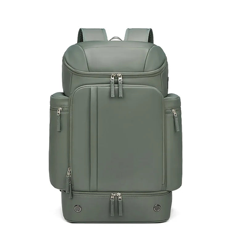 Sleek olive green travel backpack with multiple zippers and minimalist design for commuters