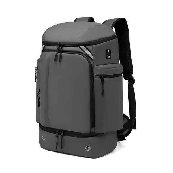 Sleek gray travel backpack with anti-theft features and vacuum compression for commuters and global travelers
